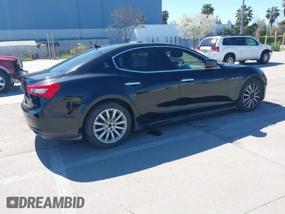 ✅ 2014 Maserati Ghibli • VIN: ZAM57XSA5E1091490 • Лот: 41848480. Опубліковано раніше на IAAI з пробігом 129 585 миль. Безкоштовний доступ до архіву аукціонних продажів зі США та докладний звіт про історію автомобіля на DreamBid. Зображення 4.