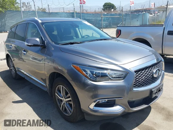 ✅ 2020 Infiniti QX60 Luxe • VIN: 5N1DL0MM5LC516116 • Lot: 45132170. Listed on IAAI with 103,982 mi. Free auction sales archive from the USA and detailed vehicle history report at DreamBid. Image 1.