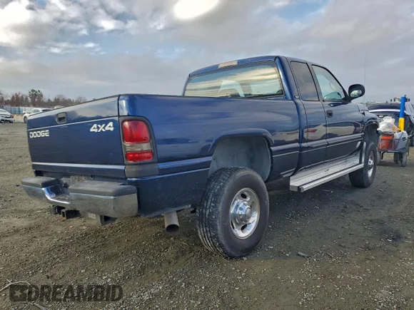 ✅ 2001 Dodge 2500 • VIN: 3B7KF23671G789814 • Lot: 96636405. Listed on Copart with 310,914 mi. Free auction sales archive from the USA and detailed vehicle history report at DreamBid. Image 3.