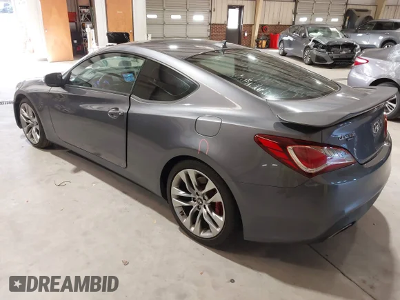 ✅ 2013 Hyundai Genesis Coupe Grand Touring • VIN: KMHHU6KJ9DU108708 • Lot: 43644209. Wystawiony na IAAI z przebiegiem 219 400 mil. Bezpłatny archiwum sprzedaży aukcyjnych z USA i szczegółowy raport historii pojazdu na DreamBid. Zdjęcie 3.