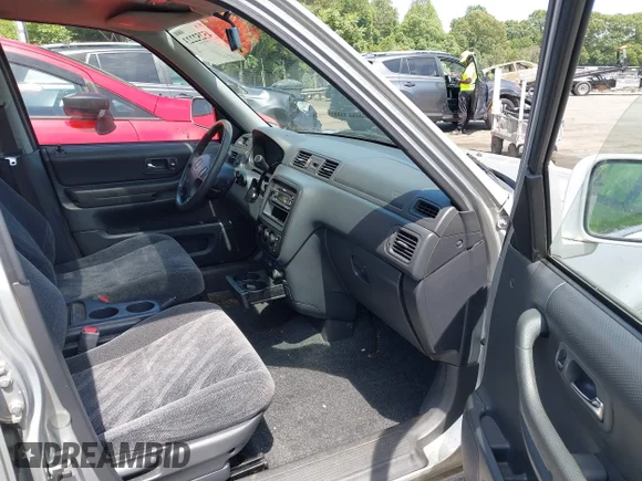 ✅ 1999 Honda CR-V EX • VIN: JHLRD1865XC025482 • Lot: 45252223. Wystawiony na IAAI z przebiegiem 180 484 mil. Bezpłatny archiwum sprzedaży aukcyjnych z USA i szczegółowy raport historii pojazdu na DreamBid. Zdjęcie 5.
