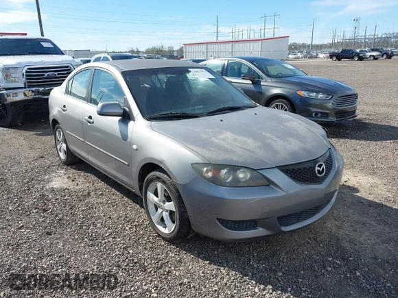 ✅ 2006 Mazda 3 i • VIN: JM1BK12FX61433838 • Lot: 44077874. Listed on IAAI with 132,053 mi. Free auction sales archive from the USA and detailed vehicle history report at DreamBid. Image 1.