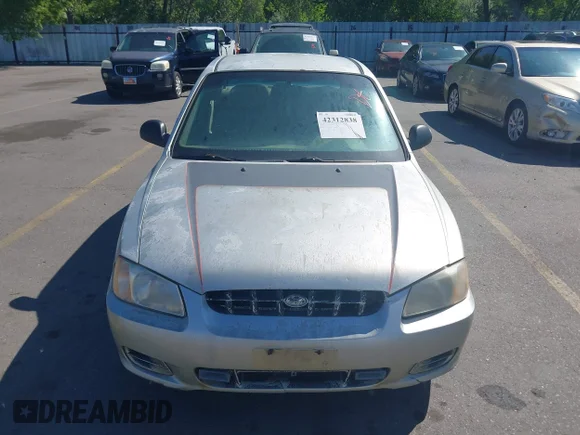 ✅ 2002 Hyundai Accent GL • VIN: KMHCG45C62U336245 • Лот: 42312838. Опубліковано раніше на IAAI з пробігом 310 753 миль. Безкоштовний доступ до архіву аукціонних продажів зі США та докладний звіт про історію автомобіля на DreamBid. Зображення 6.