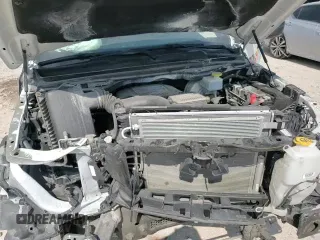 2023 Ram 1500 Tradesman z VIN 1C6RRENTXPN573635, wystawiony jako Copart lot #70497975 z przebiegiem 64 595 mil mil oraz Szkoda całkowita • Salvage title. Historia ofert i sprzedaży dostępna na DreamBid. Obrazek 14.