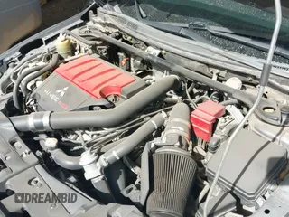 ✅ 2014 Mitsubishi Lancer Evolution GSR • VIN: JA32W8FV3EU008262 • Lot: 41653902. Wystawiony na IAAI z przebiegiem 128 977 mil. Bezpłatny archiwum sprzedaży aukcyjnych z USA i szczegółowy raport historii pojazdu na DreamBid. Zdjęcie 18.