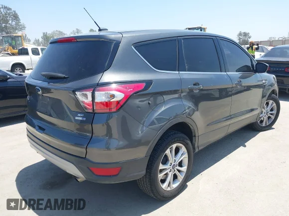 ✅ 2017 Ford Escape SE • VIN: 1FMCU9G91HUD44933 • Lot: 45306478. Listed on IAAI with 139,242 mi. Free auction sales archive from the USA and detailed vehicle history report at DreamBid. Image 4.