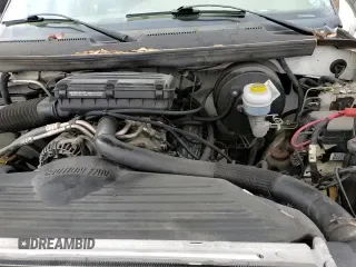 2001 Dodge 1500 с VIN 3B7HF13Z51M291983, выставлен на аукционе Copart как лот 85247634 с пробегом 121 311 миль миль и Списание • Salvage title. История ставок и продаж доступна на DreamBid. Изображение 14.