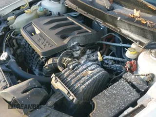 ✅ 2008 Dodge Avenger SXT • VIN: 1B3LC56K38N575235 • Лот: 41329390. Опубликован ранее на IAAI с пробегом 173 294 миль. Бесплатный доступ к архиву аукционных продаж из США и подробный отчёт об истории автомобиля на DreamBid. Изображение 12.