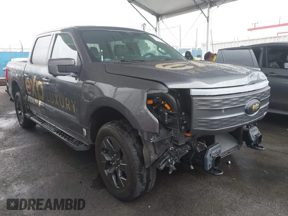 ✅ 2022 Ford F-150 Lightning Pro • VIN: 1FTVW1EL8NWG14070 • Lot: 41776980. Listed on IAAI with 14,812 mi. Free auction sales archive from the USA and detailed vehicle history report at DreamBid. Image 1.