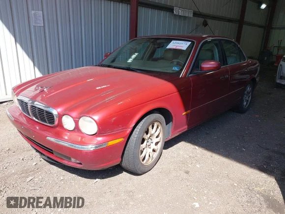 ✅ 2004 Jaguar XJ 8 • VIN: SAJWA71C34SG13267 • Lot: 43287111. Wystawiony na IAAI z przebiegiem 161 426 mil. Bezpłatny archiwum sprzedaży aukcyjnych z USA i szczegółowy raport historii pojazdu na DreamBid. Zdjęcie 2.