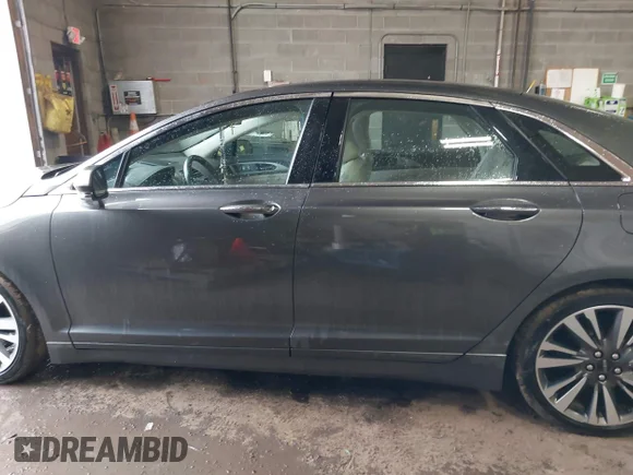 ✅ 2020 Lincoln MKZ Reserve • VIN: 3LN6L5F96LR612532 • Lot: 44696424. Wystawiony na IAAI z przebiegiem 65 549 mil. Bezpłatny archiwum sprzedaży aukcyjnych z USA i szczegółowy raport historii pojazdu na DreamBid. Zdjęcie 15.