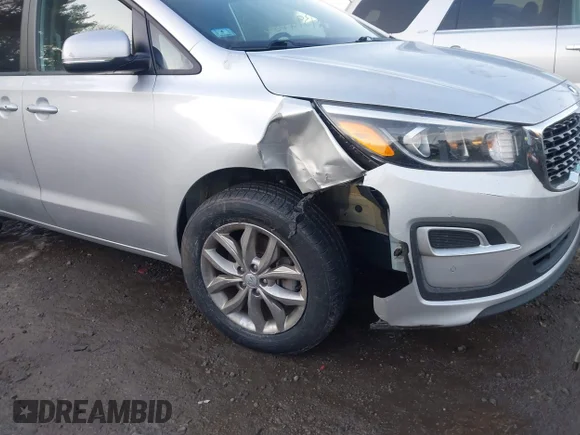 ✅ 2021 Kia Sedona LX • VIN: KNDMB5C17M6671262 • Lot: 43924515. Wystawiony na IAAI z przebiegiem 86 273 mil. Bezpłatny archiwum sprzedaży aukcyjnych z USA i szczegółowy raport historii pojazdu na DreamBid. Zdjęcie 6.