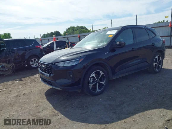 ✅ 2025 Ford Escape ST-Line Select • VIN: 1FMCU9NA3SUA72261 • Lot: 44997957. Listed on IAAI with 17,761 mi. Free auction sales archive from the USA and detailed vehicle history report at DreamBid. Image 2.