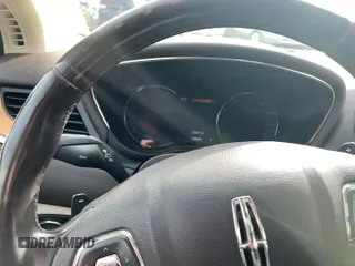 ✅ 2015 Lincoln MKC • VIN: 5LMTJ2AH8FUJ41497 • Лот: 95312785. Опубликован ранее на Copart с пробегом 149 617 миль. Бесплатный доступ к архиву аукционных продаж из США и подробный отчёт об истории автомобиля на DreamBid. Изображение 11.