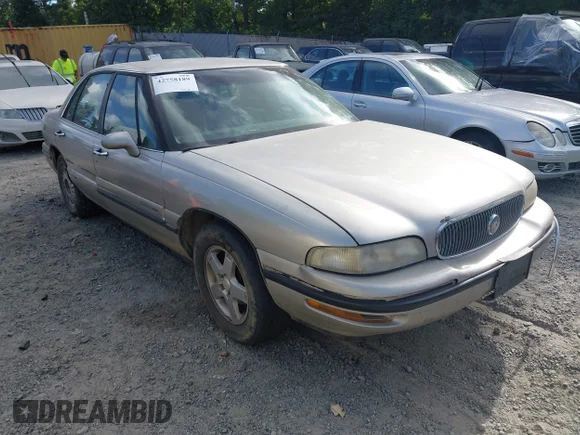 ✅ 1997 Buick LeSabre Custom • VIN: 1G4HP52K2VH412399 • Lot: 42758189. Wystawiony na IAAI z przebiegiem 125 451 mil. Bezpłatny archiwum sprzedaży aukcyjnych z USA i szczegółowy raport historii pojazdu na DreamBid. Zdjęcie 1.