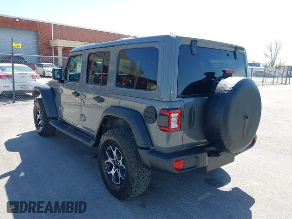 ✅ 2021 Jeep Wrangler Unlimited Rubicon • VIN: 1C4HJXFG1MW604608 • Lot: 44588340. Listed on IAAI with 56,971 mi. Free auction sales archive from the USA and detailed vehicle history report at DreamBid. Image 3.