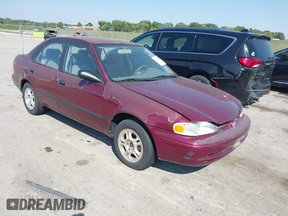 ✅ 1998 Chevrolet Prizm Lsi • VIN: 1Y1SK5280WZ444904 • Лот: 43243002. Опубликован ранее на IAAI с пробегом 121 764 миль. Бесплатный доступ к архиву аукционных продаж из США и подробный отчёт об истории автомобиля на DreamBid. Изображение 1.