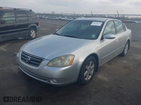 ✅ 2002 Nissan Altima S • VIN: 1N4AL11D52C294859 • Lot: 41556977. Wystawiony na IAAI z przebiegiem 275 324 mil. Bezpłatny archiwum sprzedaży aukcyjnych z USA i szczegółowy raport historii pojazdu na DreamBid. Zdjęcie 2.