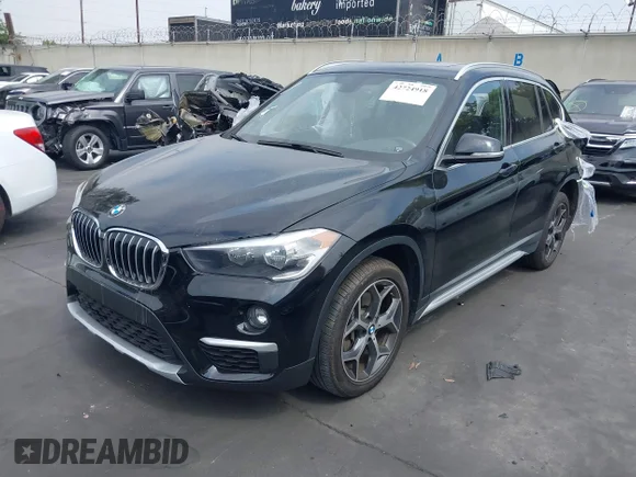 ✅ 2018 BMW X1 xDrive28i • VIN: WBXHT3C38J5L33992 • Лот: 42724918. Опубликован ранее на IAAI с пробегом 40 894 миль. Бесплатный доступ к архиву аукционных продаж из США и подробный отчёт об истории автомобиля на DreamBid. Изображение 2.