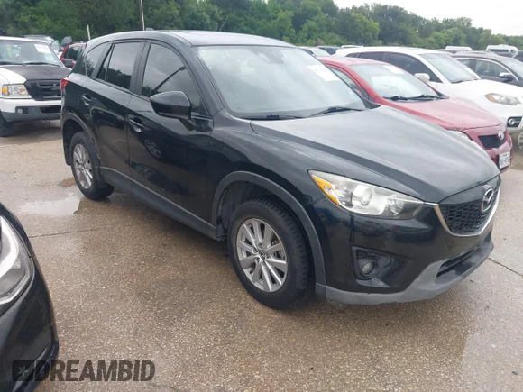 ✅ 2014 Mazda CX-5 Grand Touring • VIN: JM3KE2DY0E0421141 • Lot: 45220468. Wystawiony na IAAI z przebiegiem 119 215 mil. Bezpłatny archiwum sprzedaży aukcyjnych z USA i szczegółowy raport historii pojazdu na DreamBid. Zdjęcie 1.