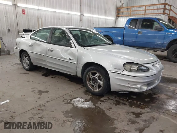 ✅ 2002 Pontiac Grand Am GT • VIN: 1G2NW52E62M599769 • Лот: 43843247. Опубликован ранее на IAAI с пробегом 319 182 миль. Бесплатный доступ к архиву аукционных продаж из США и подробный отчёт об истории автомобиля на DreamBid. Изображение 1.