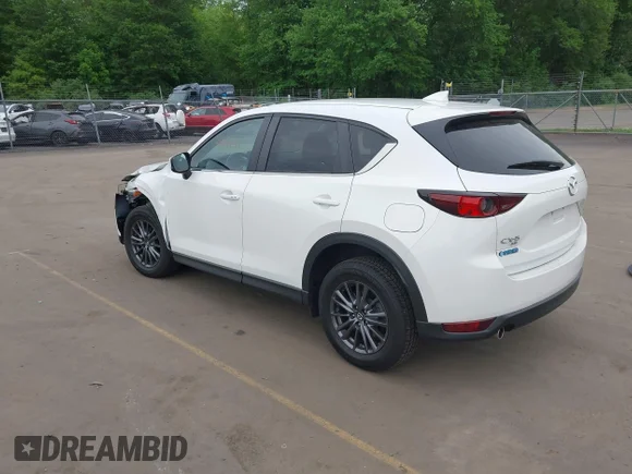 ✅ 2021 Mazda CX-5 Touring • VIN: JM3KFBCM6M0366477 • Лот: 45191298. Опубліковано раніше на IAAI з пробігом 33 534 миль. Безкоштовний доступ до архіву аукціонних продажів зі США та докладний звіт про історію автомобіля на DreamBid. Зображення 3.