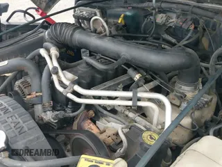 ✅ 2000 Jeep Wrangler Sahara • VIN: 1J4FA59S5YP700649 • Лот: 43291151. Опубликован ранее на IAAI с пробегом 183 974 миль. Бесплатный доступ к архиву аукционных продаж из США и подробный отчёт об истории автомобиля на DreamBid. Изображение 21.