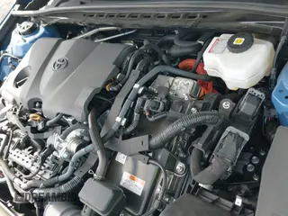 ✅ 2024 Toyota Camry Hybrid SE • VIN: 4T1S31AKXRU075697 • Лот: 42563623. Опубликован ранее на IAAI с пробегом 19 545 миль. Бесплатный доступ к архиву аукционных продаж из США и подробный отчёт об истории автомобиля на DreamBid. Изображение 20.