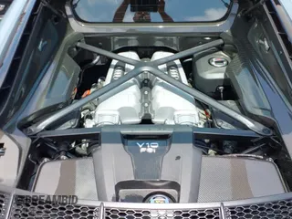 ✅ 2023 Audi R8 performance quattro • VIN: WUAKBAFX4P7902281 • Лот: 42499575. Опубликован ранее на IAAI с пробегом 991 миль. Бесплатный доступ к архиву аукционных продаж из США и подробный отчёт об истории автомобиля на DreamBid. Изображение 19.