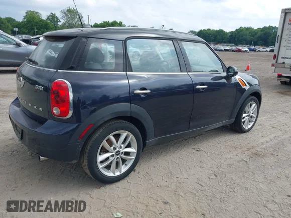 ✅ 2014 MINI Countryman • VIN: WMWZB3C50EWR36406 • Lot: 45358565. Listed on IAAI with 138,038 mi. Free auction sales archive from the USA and detailed vehicle history report at DreamBid. Image 4.