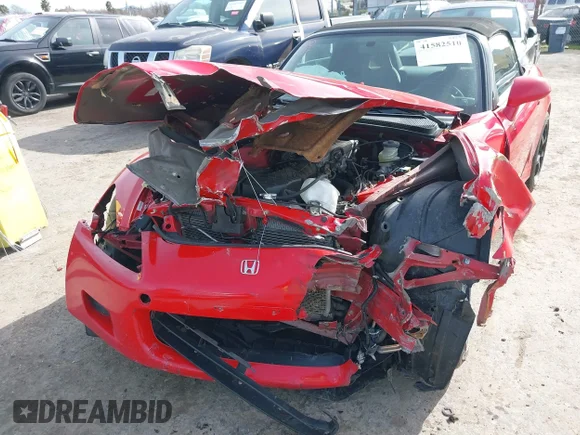✅ 2000 Honda S2000 • VIN: JHMAP1143YT000526 • Lot: 41582510. Listed on IAAI with 114,783 mi. Free auction sales archive from the USA and detailed vehicle history report at DreamBid. Image 6.