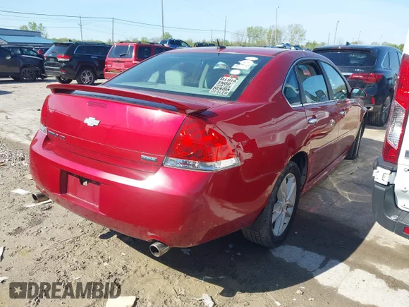 ✅ 2013 Chevrolet Impala LTZ • VIN: 2G1WC5E3XD1206379 • Lot: 45013139. Listed on IAAI with 216,663 mi. Free auction sales archive from the USA and detailed vehicle history report at DreamBid. Image 4.