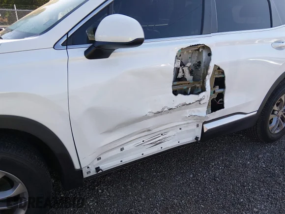 ✅ 2019 Hyundai Santa Fe SE • VIN: 5NMS23AD9KH096431 • Лот: 45167366. Опубліковано раніше на IAAI з пробігом 77 421 миль. Безкоштовний доступ до архіву аукціонних продажів зі США та докладний звіт про історію автомобіля на DreamBid. Зображення 6.