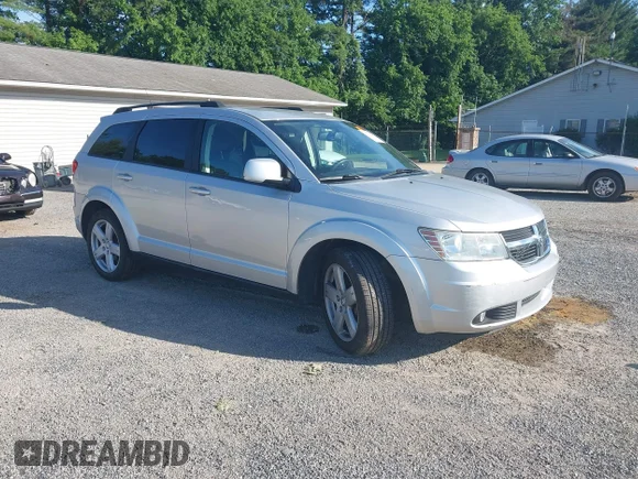 ✅ 2010 Dodge Journey SXT • VIN: 3D4PH5FV1AT148334 • Lot: 45371216. Listed on IAAI with 77,729 mi. Free auction sales archive from the USA and detailed vehicle history report at DreamBid. Image 1.