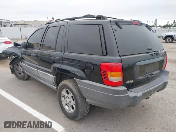 ✅ 2000 Jeep Grand Cherokee Laredo • VIN: 1J4G248S5YC258704 • Лот: 45019151. Опубліковано раніше на IAAI з пробігом 170 606 миль. Безкоштовний доступ до архіву аукціонних продажів зі США та докладний звіт про історію автомобіля на DreamBid. Зображення 3.