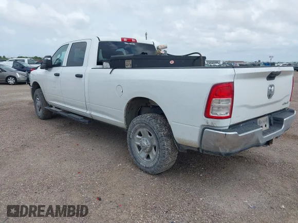 ✅ 2023 Ram 2500 Tradesman • VIN: 3C6UR5HJ3PG516027 • Lot: 45191709. Listed on IAAI with 56,287 mi. Free auction sales archive from the USA and detailed vehicle history report at DreamBid. Image 3.