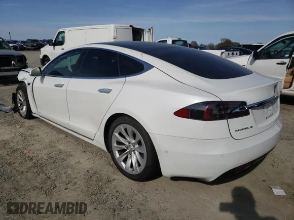 ✅ 2017 Tesla Model S 100D • VIN: 5YJSA1E25HF208748 • Lot: 46284343. Listed on Copart with 96,984 mi. Free auction sales archive from the USA and detailed vehicle history report at DreamBid. Image 2.