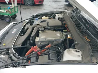 ✅ 2014 Ford Fusion Titanium • VIN: 3FA6P0SU7ER103290 • Lot: 43715409. Listed on IAAI with 257,425 mi. Free auction sales archive from the USA and detailed vehicle history report at DreamBid. Image 12.