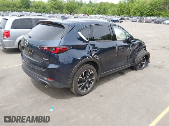 ✅ 2023 Mazda CX-5 S Premium • VIN: JM3KFBDM1P0265513 • Lot: 45196758. Listed on IAAI with 13,402 mi. Free auction sales archive from the USA and detailed vehicle history report at DreamBid. Image 4.