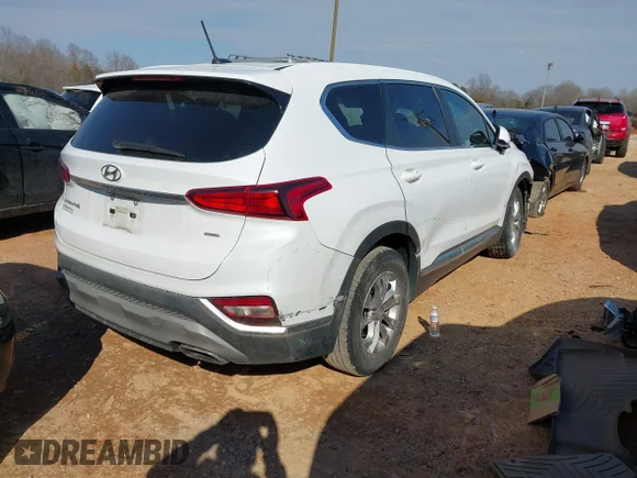 ✅ 2019 Hyundai Santa Fe SE • VIN: 5NMS2CAD8KH032557 • Лот: 44338963. Опубликован ранее на IAAI с пробегом 159 631 миль. Бесплатный доступ к архиву аукционных продаж из США и подробный отчёт об истории автомобиля на DreamBid. Изображение 4.