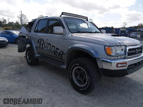 ✅ 1996 Toyota 4Runner Limited • VIN: JT3HN87R5T0029901 • Lot: 44700404. Listed on IAAI with 306,453 mi. Free auction sales archive from the USA and detailed vehicle history report at DreamBid. Image 1.