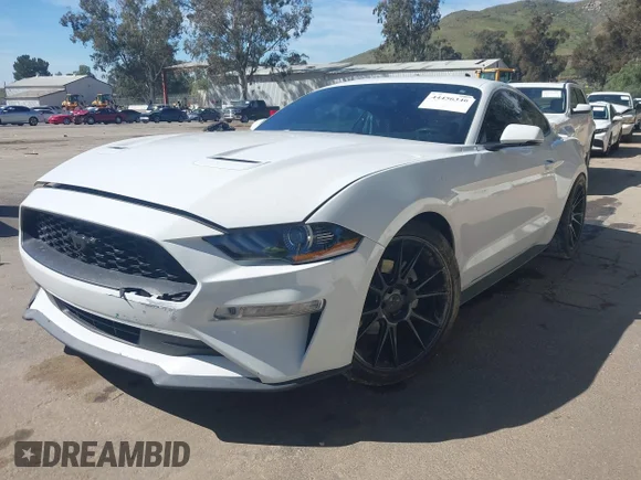 ✅ 2019 Ford Mustang EcoBoost • VIN: 1FA6P8TH9K5186431 • Lot: 44456346. Listed on IAAI with 69,943 mi. Free auction sales archive from the USA and detailed vehicle history report at DreamBid. Image 2.