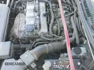 ✅ 2002 Mazda Protege • VIN: JM1BJ245821501352 • Lot: 42619327. Listed on IAAI with 235,130 mi. Free auction sales archive from the USA and detailed vehicle history report at DreamBid. Image 12.