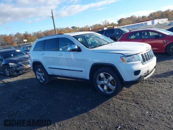 ✅ 2013 Jeep Grand Cherokee Limited • VIN: 1C4RJFBT1DC574710 • Lot: 43582984. Listed on IAAI with 211,876 mi. Free auction sales archive from the USA and detailed vehicle history report at DreamBid. Image 13.
