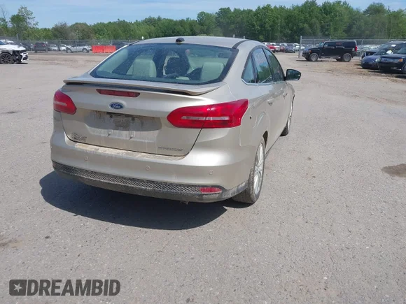 ✅ 2018 Ford Focus Titanium • VIN: 1FADP3J27JL272095 • Лот: 45296238. Опубликован ранее на IAAI с пробегом 72 922 миль. Бесплатный доступ к архиву аукционных продаж из США и подробный отчёт об истории автомобиля на DreamBid. Изображение 4.