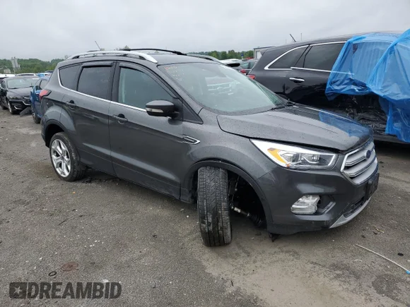 ✅ 2019 Ford Escape Titanium • VIN: 1FMCU9J92KUC37227 • Лот: 52689344. Опубликован ранее на Copart с пробегом 63 358 миль. Бесплатный доступ к архиву аукционных продаж из США и подробный отчёт об истории автомобиля на DreamBid. Изображение 4.