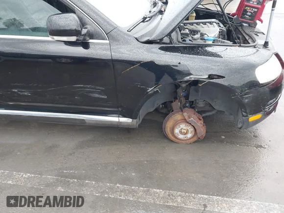 ✅ 2004 Volkswagen Touareg • VIN: WVGBC67L64D008987 • Lot: 44038197. Wystawiony na IAAI z przebiegiem 137 856 mil. Bezpłatny archiwum sprzedaży aukcyjnych z USA i szczegółowy raport historii pojazdu na DreamBid. Zdjęcie 6.
