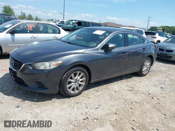 ✅ 2014 Mazda 6 i Sport • VIN: JM1GJ1U67E1129094 • Lot: 42765267. Listed on IAAI with 219,287 mi. Free auction sales archive from the USA and detailed vehicle history report at DreamBid. Image 2.