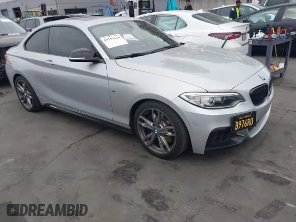 ✅ 2016 BMW 2 Series M235i • VIN: WBA1J7C52GV289779 • Lot: 44361628. Listed on IAAI with 56,661 mi. Free auction sales archive from the USA and detailed vehicle history report at DreamBid. Image 1.