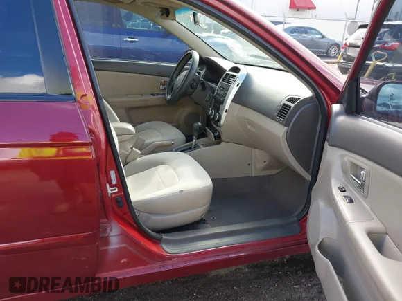 ✅ 2009 Kia Spectra EX • VIN: KNAFE221595648959 • Лот: 43391189. Опубліковано раніше на IAAI з пробігом 217 991 миль. Безкоштовний доступ до архіву аукціонних продажів зі США та докладний звіт про історію автомобіля на DreamBid. Зображення 5.